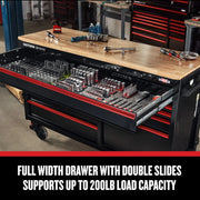 Craftsman black workbench CMSTVS6311BK, full-width drawer open, sockets and tools organized, workshop background.